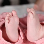 Newborn bends his legs