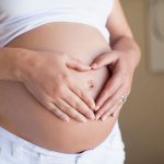 Живот беременной женщины